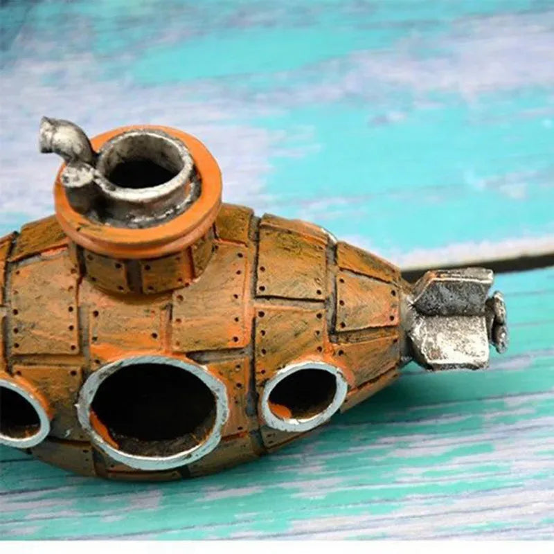 Snugll aquascaping submarine accessory in rustic orange and silver detail for aquarium decoration