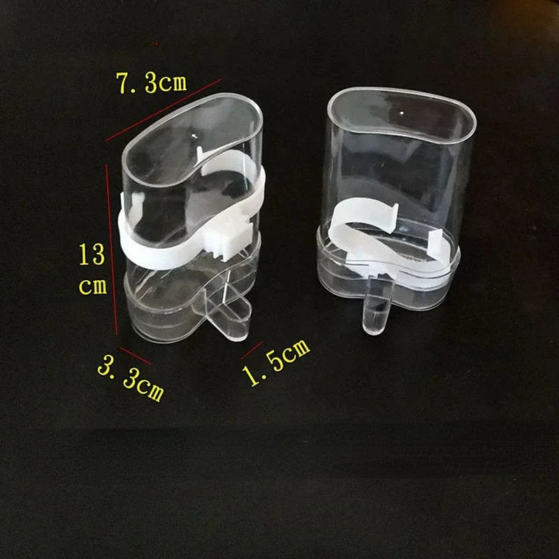 Clear plastic bird feeder attachments with white clips for Snugll automatic bird feeder measuring 13cm height