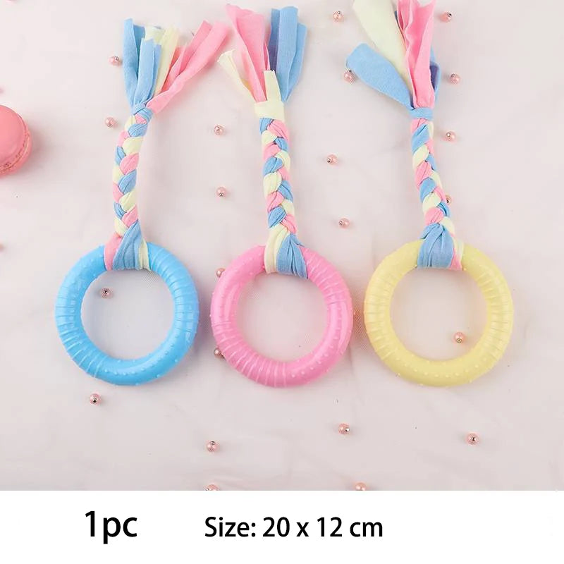 Snugll pets durable dog chew toys in pastel blue pink and yellow with braided fabric handles