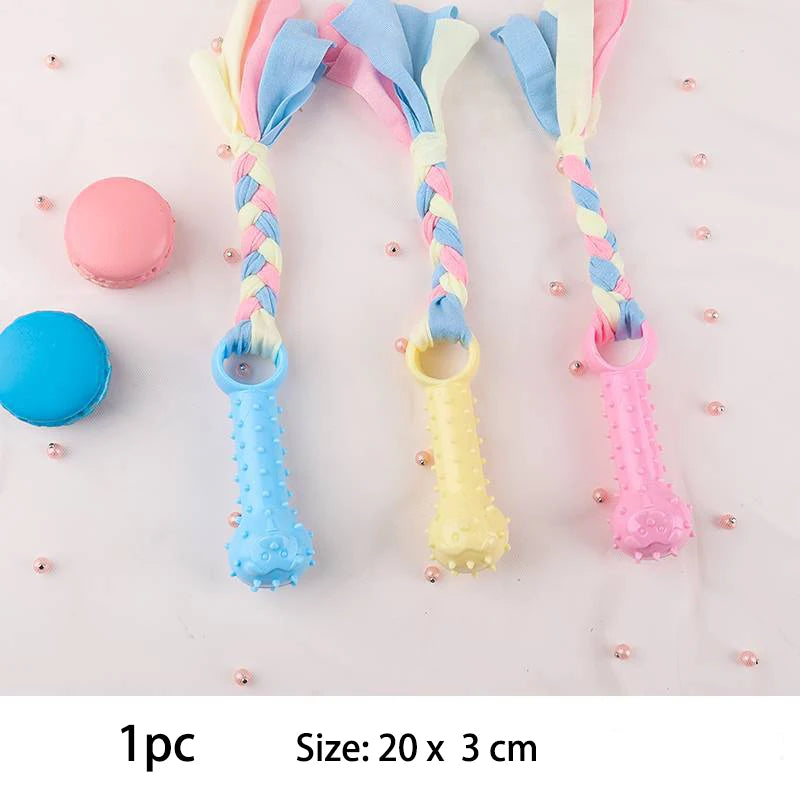 Colorful durable dog chew toys by Snugll pets with braided fabric and rubber spiked handles in blue yellow and pink