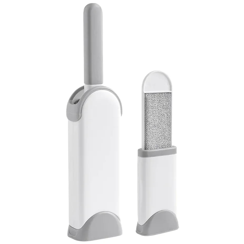 Snugll electrostatic pet hair remover in white and gray with brush and compact design