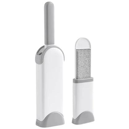 Snugll electrostatic pet hair remover in white and gray with brush and compact design