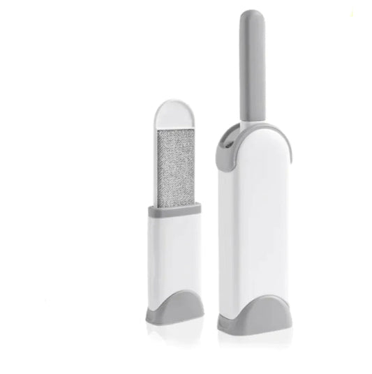 Snugll electrostatic pet hair remover with white and gray handle and base for easy cleaning