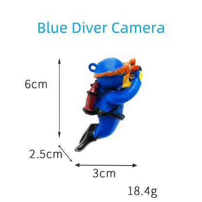 Floating blue diver aquarium decor shaped as a small diver with camera measuring 6cm by 3cm