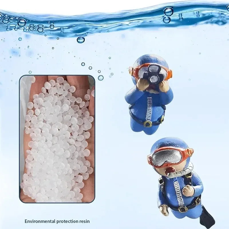 Floating blue diver aquarium decor showing two blue scuba diver figurines underwater with resin beads