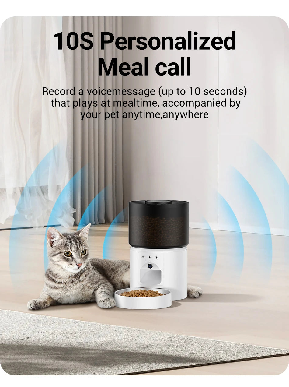 Snugll automatic dog feeder with camera showing 10-second personalized meal call feature near a cat