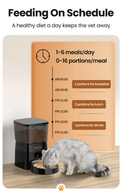 Snugll timed dog feeder with portion control displaying scheduled meals and a cat eating from the feeder