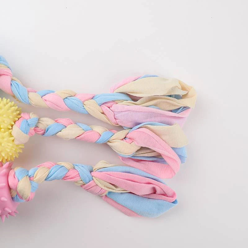 Snugll pets durable dog chew toys with braided pink blue beige fabric and textured yellow and pink balls