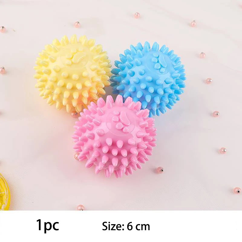 Snugll pets durable dog chew toys spiky balls in yellow blue and pink for powerful chewers
