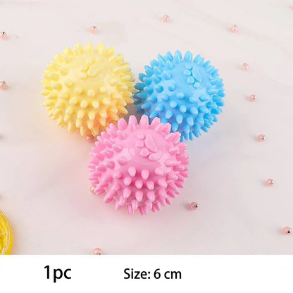 Snugll pets durable dog chew toys spiky balls in yellow blue and pink for powerful chewers