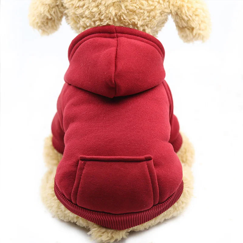 Cute pet hoodie for puppies in red fleece with a back pocket and hood on a small dog